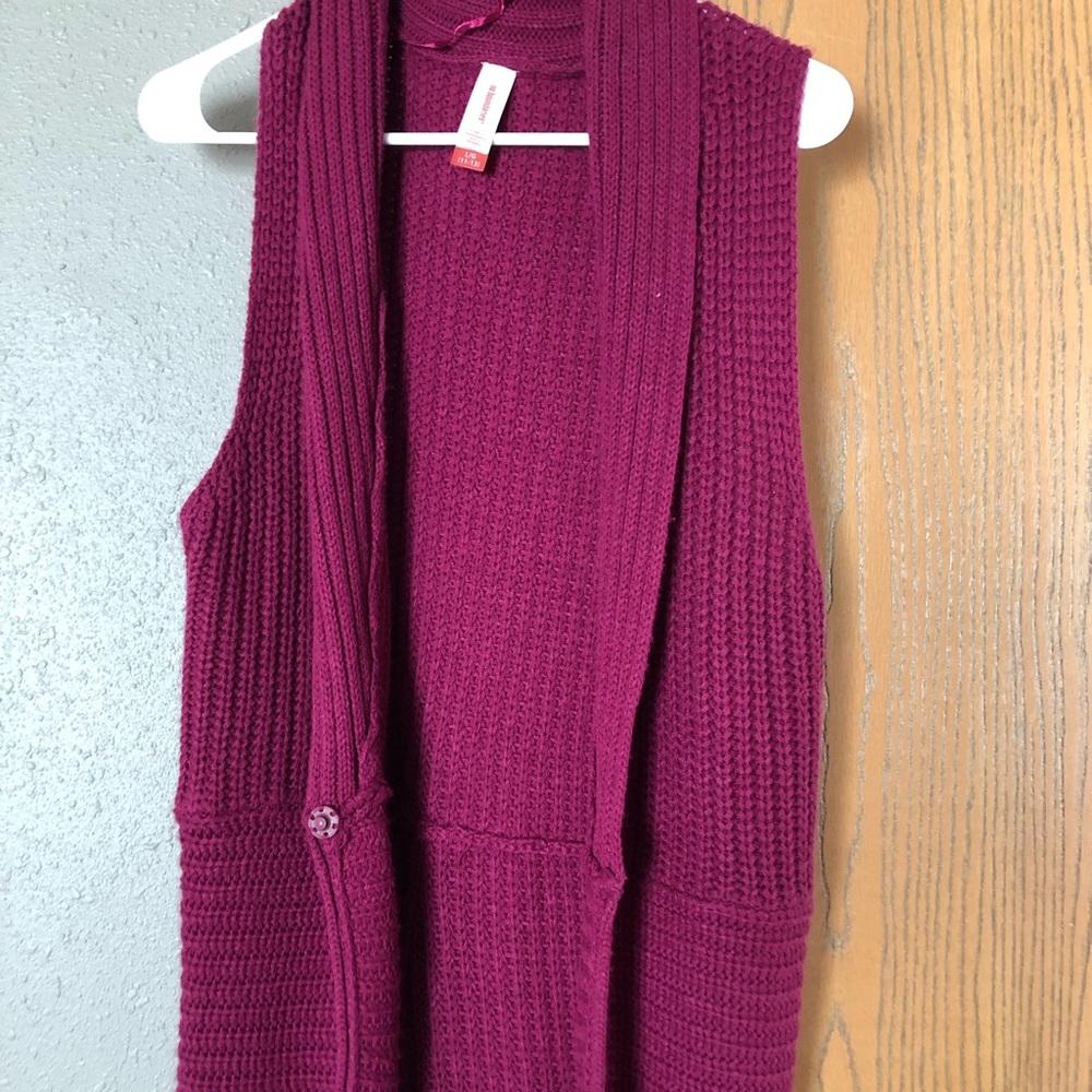 Long sleeveless sweater
